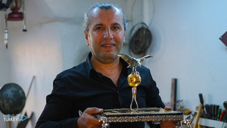 A Turkish jewelry designs gold and silver cups for the Qatar World Cup